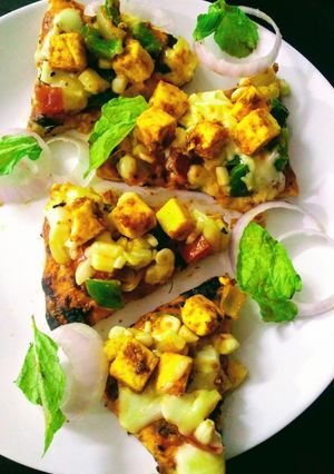 A picture of Paneer tikka cheese burst pizza.