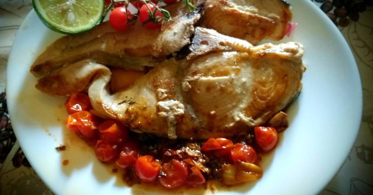 Slice of grilled swordfish in cherry tomato sauce😋😋👍😛 Recipe by isabel