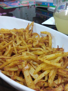Una foto de Papas fritas en freidora de aire