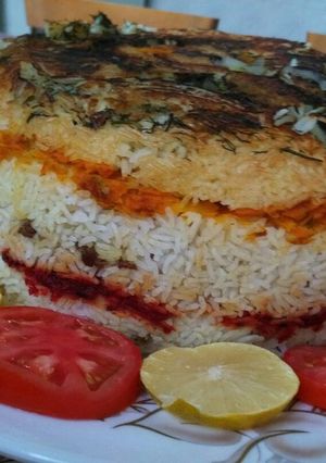 صورة لوصفة طبقات الارز الملونه