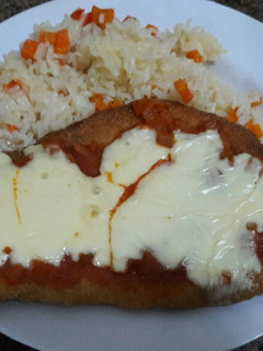 Una foto de Milanesa de pollo a la napolitana