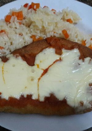 Una foto de Milanesa de pollo a la napolitana