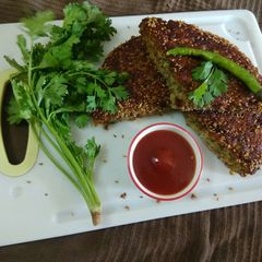 A picture of Rice and Green Gram Split Dal Handva.