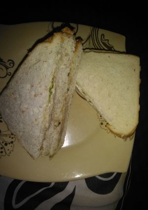 A picture of Eggs, Tuna and Mayo Sandwish.