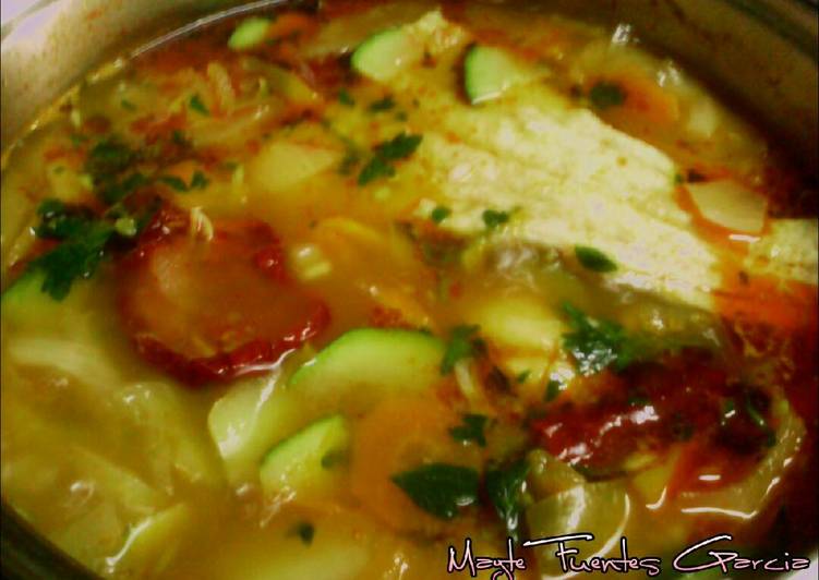 Patatas con arroz y bacalao