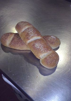 Una foto de Baggette de finas hierbas y queso parmesano