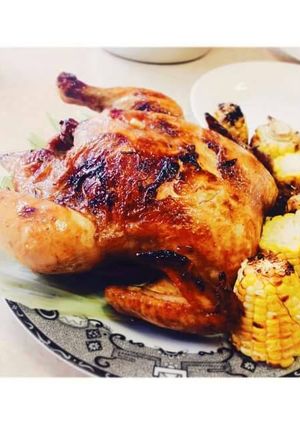 A picture of Naked Roast Chicken with pepay marinade.