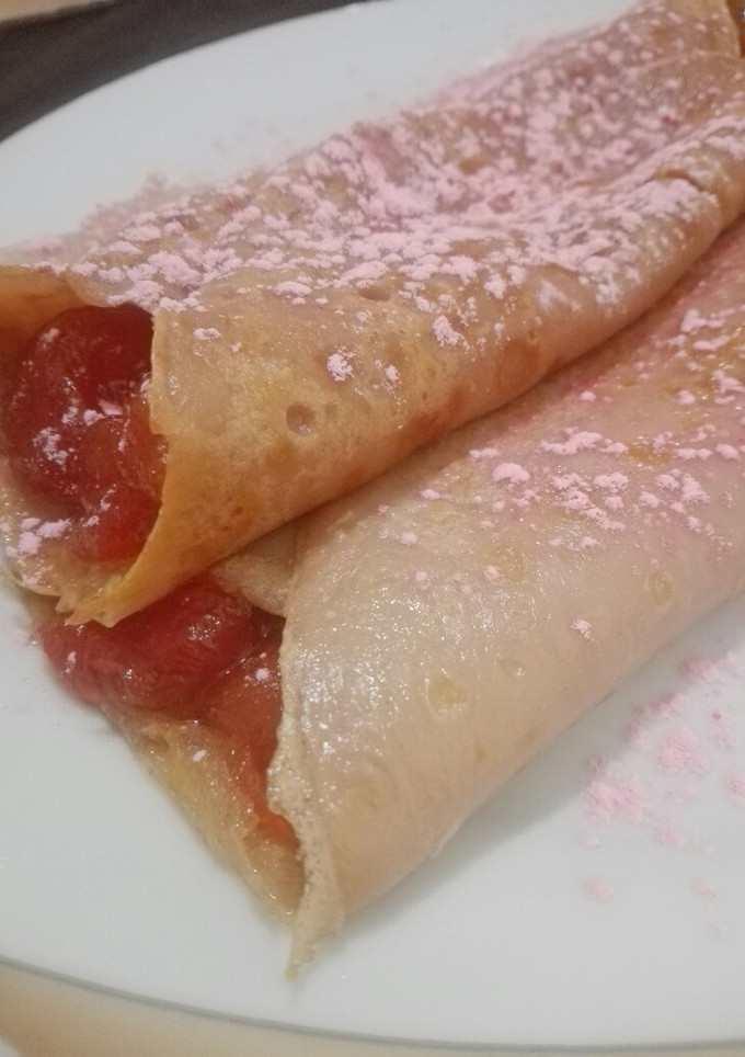 Una foto de Crepes rosas a la confitura de tomates