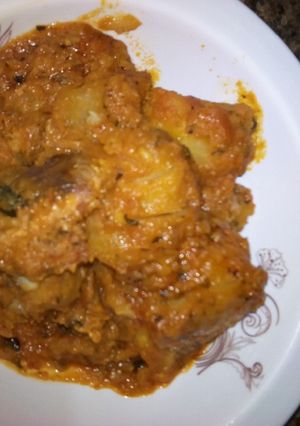 A picture of Yam porridge and moringa.