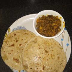 Poranpuri with chana ke sabji A picture of Poranpuri with chana ke sabji.