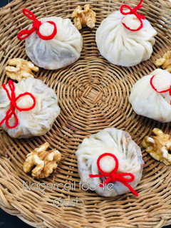 வால்நட் ஸ்டப்டு ஸ்வீட் பவுச் (Walnut Stuffed Sweet Pouch Recipe in Tamil) செய்முறை முக்கிய புகைப்படம்