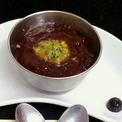 A picture of    plum puree with kiwi.