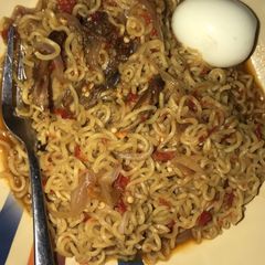 A picture of Indomie with egg 🥚.