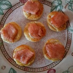 A picture of Salmon and philly puffs.