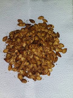 A picture of Spicy Cajun Roasted Pumpkin Seeds.