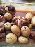 Costillitas con patatas al horno