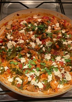 A picture of Greek Orzo with chicken and kale.