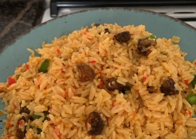 Asun fried rice | goat meat rice Recipe by mrs zaynnab - Cookpad