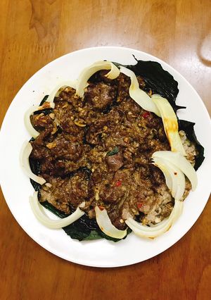 A picture of Grilled Beef in Betel Leaves.