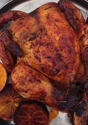 Una foto de Pollo horneado al limón y romero