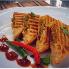 A picture of Stuffed Rava Triangles.