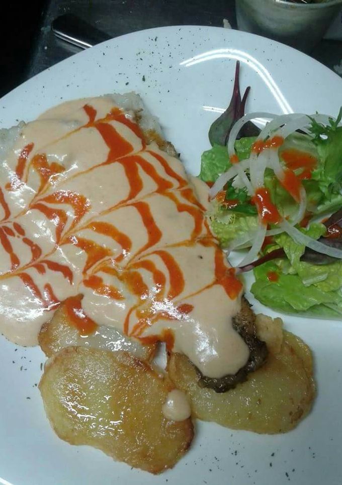 Una foto de Bacalao en salsa holandesa