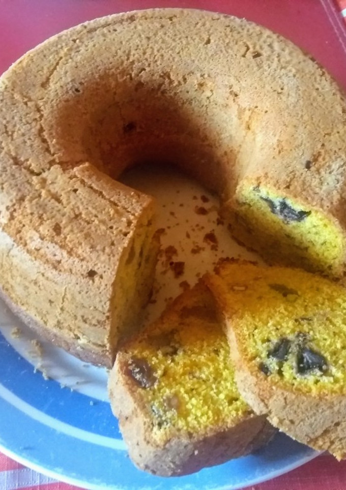 Una foto de Queque de zanahoria con nueces, pasas y trocitos de chocolate