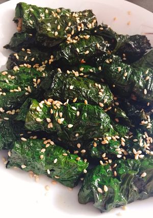 A picture of Grilled Beef Wrapped in Betel Leaves.