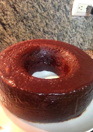 Una foto de Deliciosa torta o pastel de leche condensada bañado en chocolate