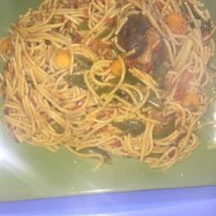A picture of Spaghetti with vegetables.