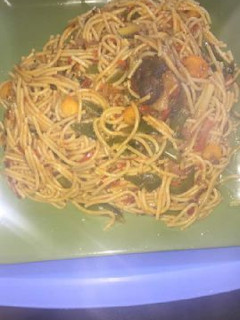 A picture of Spaghetti with vegetables.