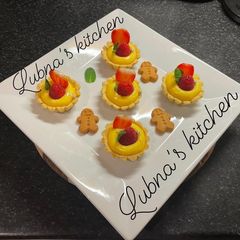 Mini Fruit Tarts with Vanilla Pastry Cream A picture of Mini Fruit Tarts with Vanilla Pastry Cream.