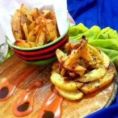 A picture of Potato wedges.