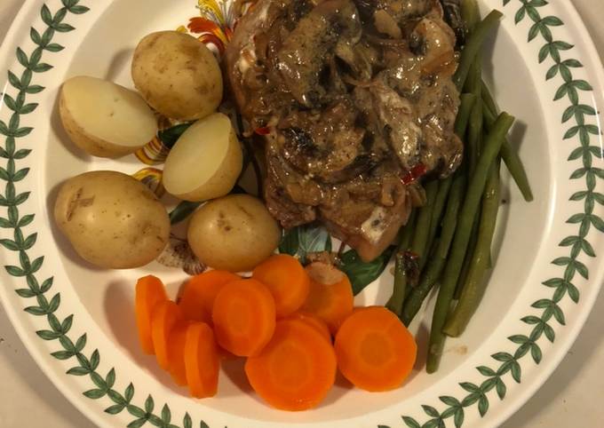 Pork steaks in mushroom, garlic, shallot and crème fraîche sauce