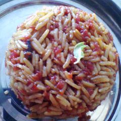 A picture of Gud gajar rice (jaggery carrot rice).