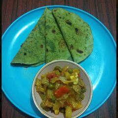 A picture of Palak Cheese Paratha.
