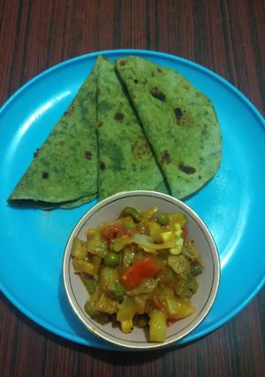 A picture of Palak Cheese Paratha.