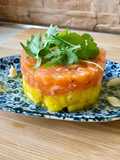 Tartare di salmone, mango, rucola e maionese al wasabi