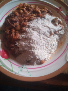 A picture of Beans and dry garri.