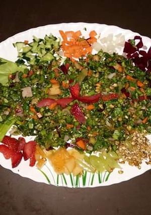 A picture of Mediterranean salad /Fruits-Sprouts-Vegetable Salad.