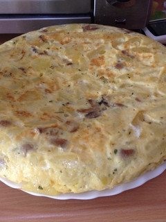 Una foto de Tortilla con champis y queso