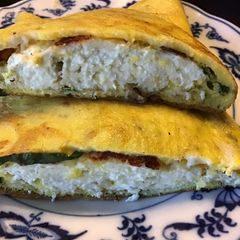 A picture of California Farm Handmade Cottage Cheese Stuffed Omelette.
