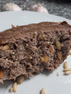 Una foto de Kibbe al horno con piñones