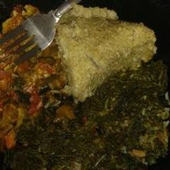 A picture of Stewed Lung fish (Kamongo) with ugali & managu.