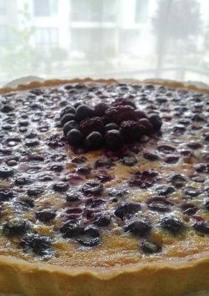 Una foto de Kuchen de arándanos y frambuesas
