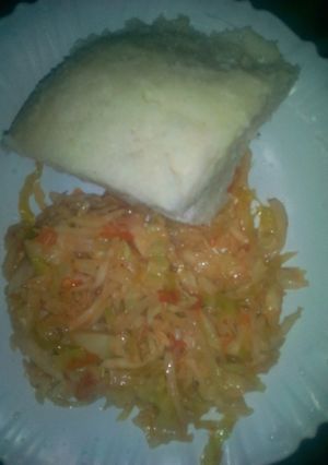 A picture of Fried cabbage and ugali.