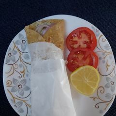 A picture of Murg malai roll.