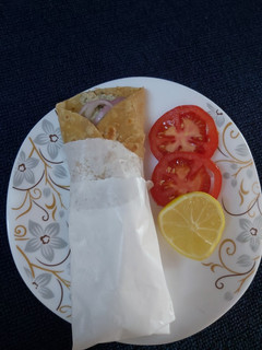 A picture of Murg malai roll.