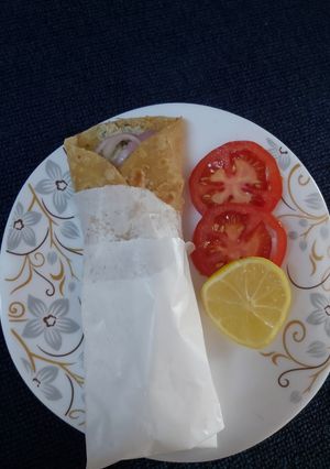 A picture of Murg malai roll.