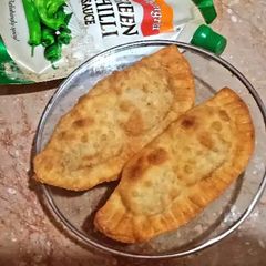 A picture of D shape samosa.
